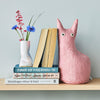 the curious doorstop / bookend - pink