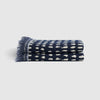 Navy dots throw